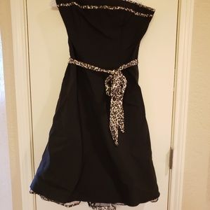Black dress with animal print trim